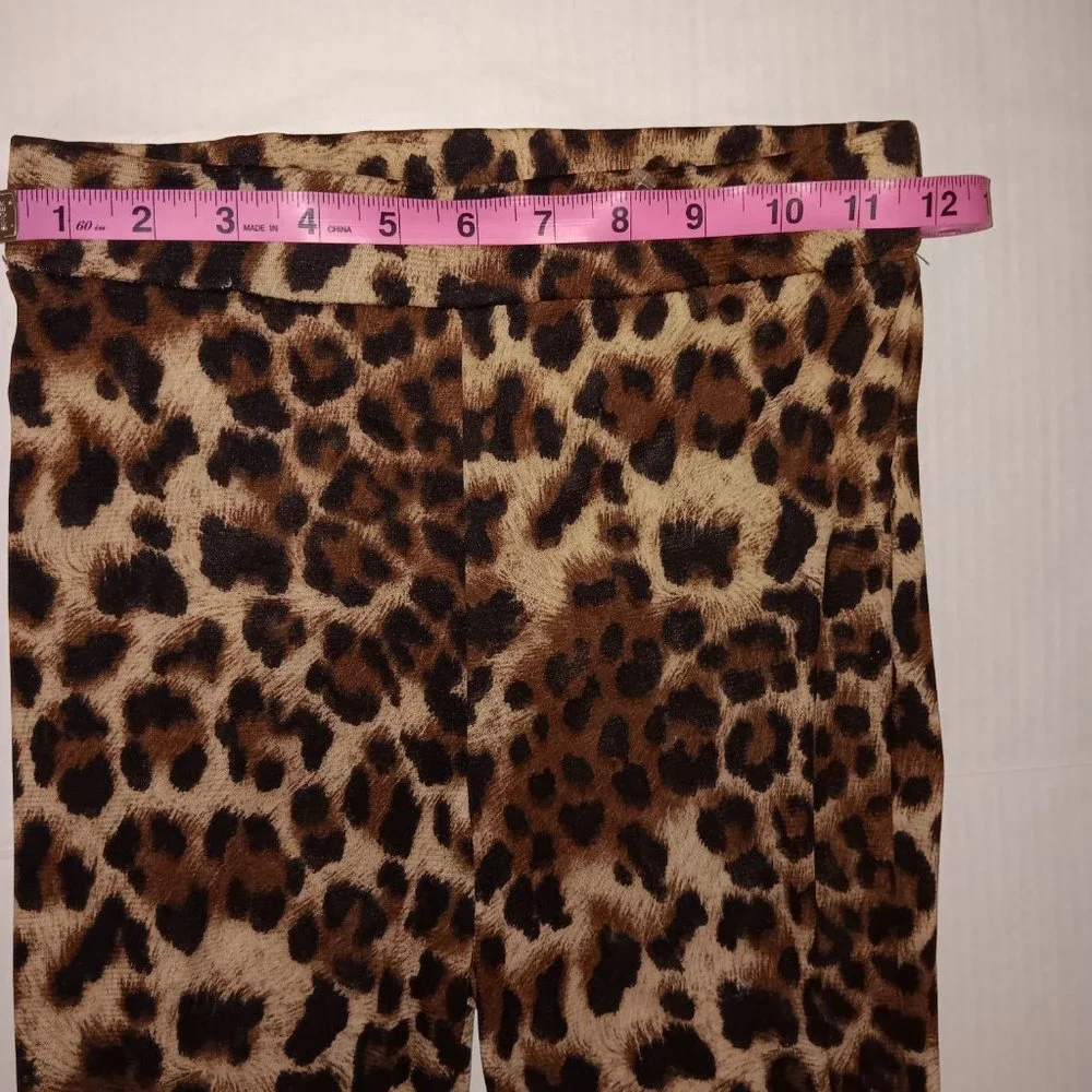 FASHION NOVA SHEER FLARE LEG ANIMAL PRINT PANTS SIZE SMALL